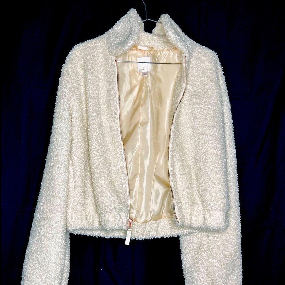 Light cream jacket cute. Used but in great condition